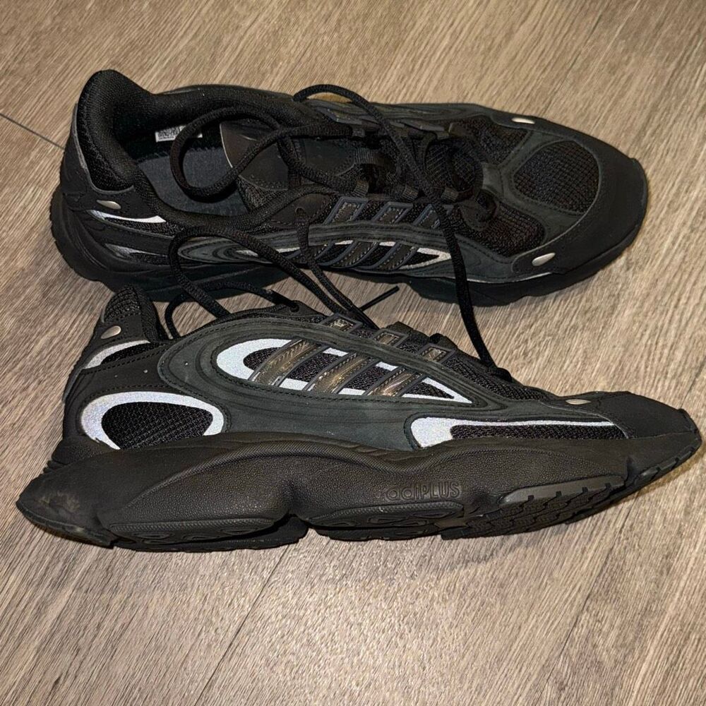 all-black Adidas Ozmillen sneakers featuring Adiplus cushioning